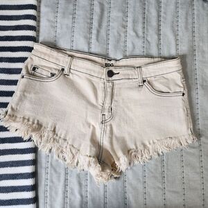 BDG Cream Colored Distressed Short Shorts